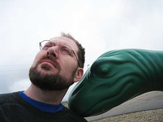 Troy Ehlers chilling with a Sinclair gas station dinosaur